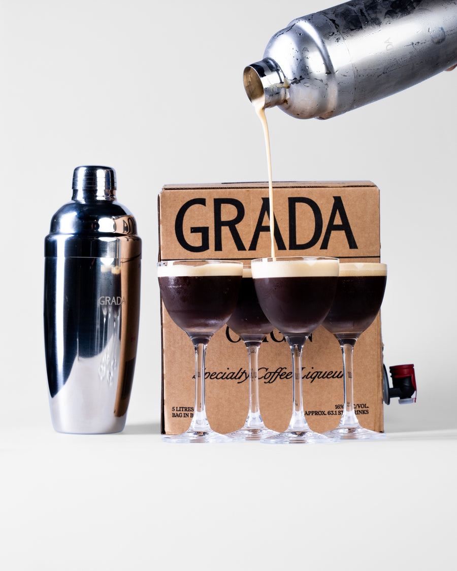 Pouring a round of four espresso martinis from the 5L