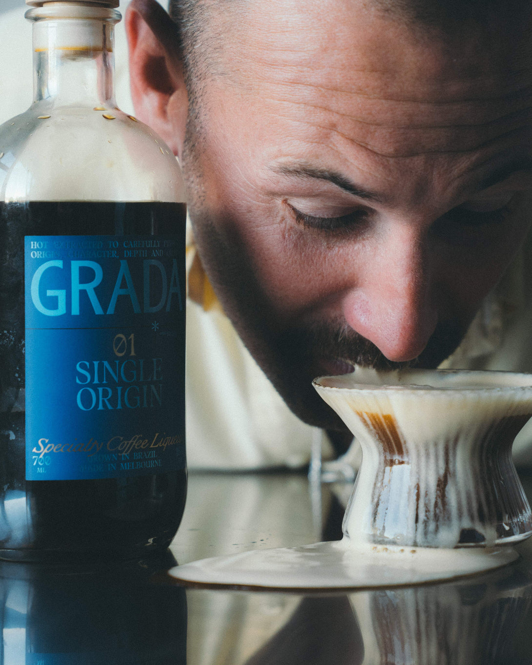 GRADA Gift Box 01 — open box showing contents: 700ml bottle, shaker, Japanese coupe, recipe book.