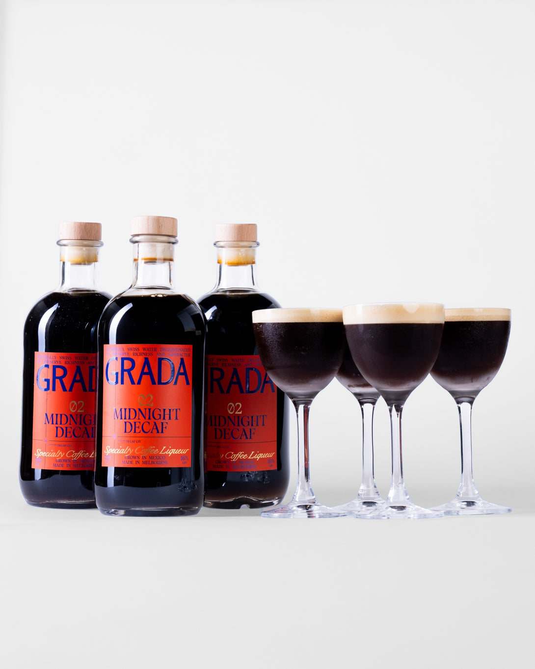 Three bottles of GRADA 02 Midnight Decaf with espresso martinis