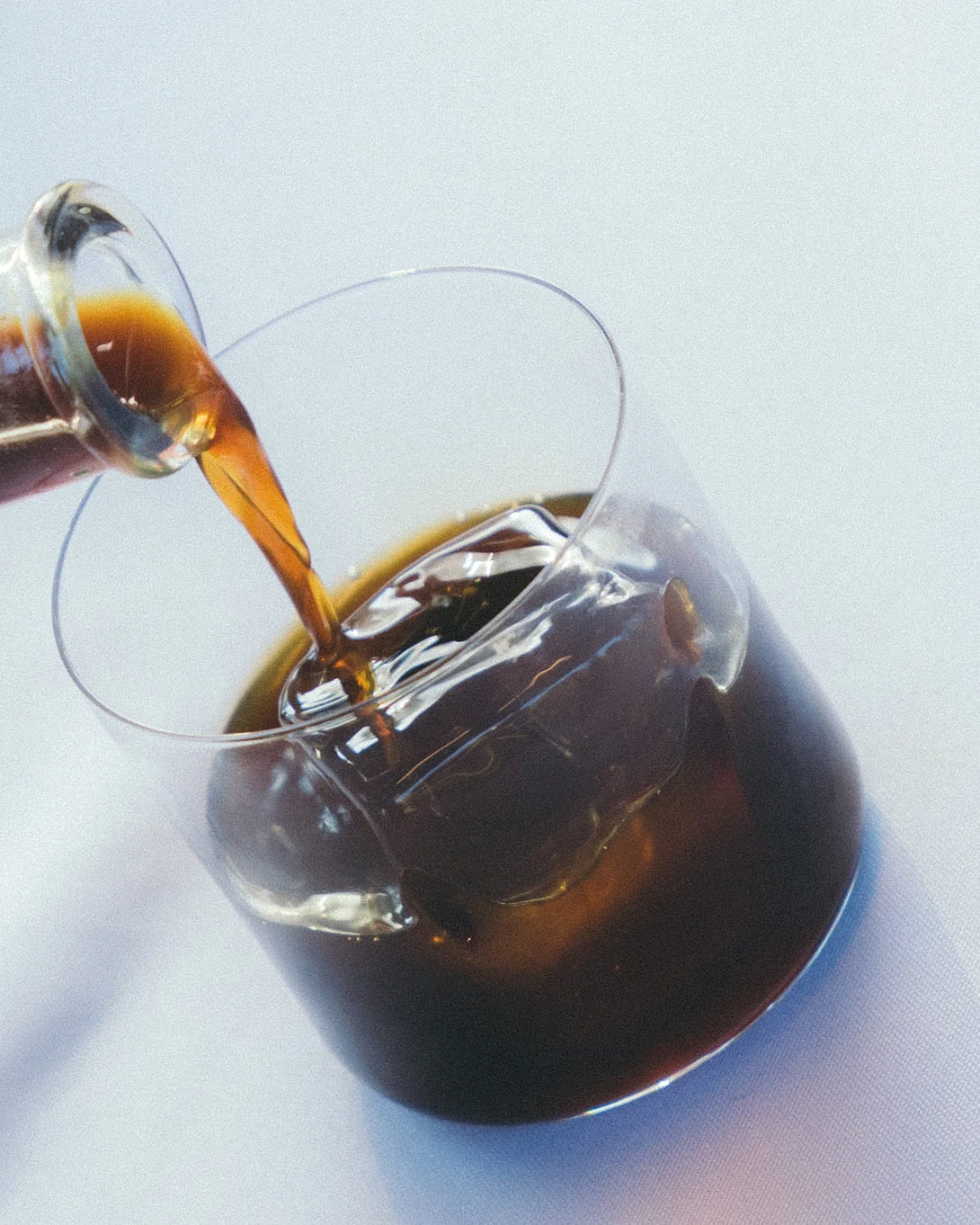 GRADA 01 Single Origin — bottle in context with espresso martini coupe.