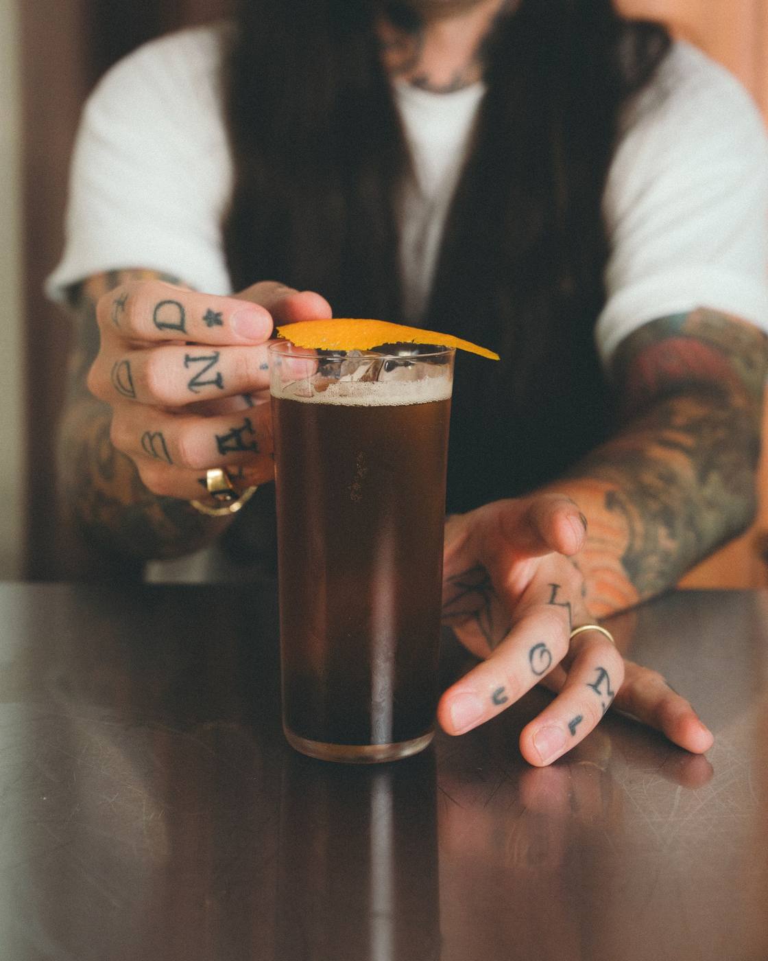 A long GRADA highball with an orange twist