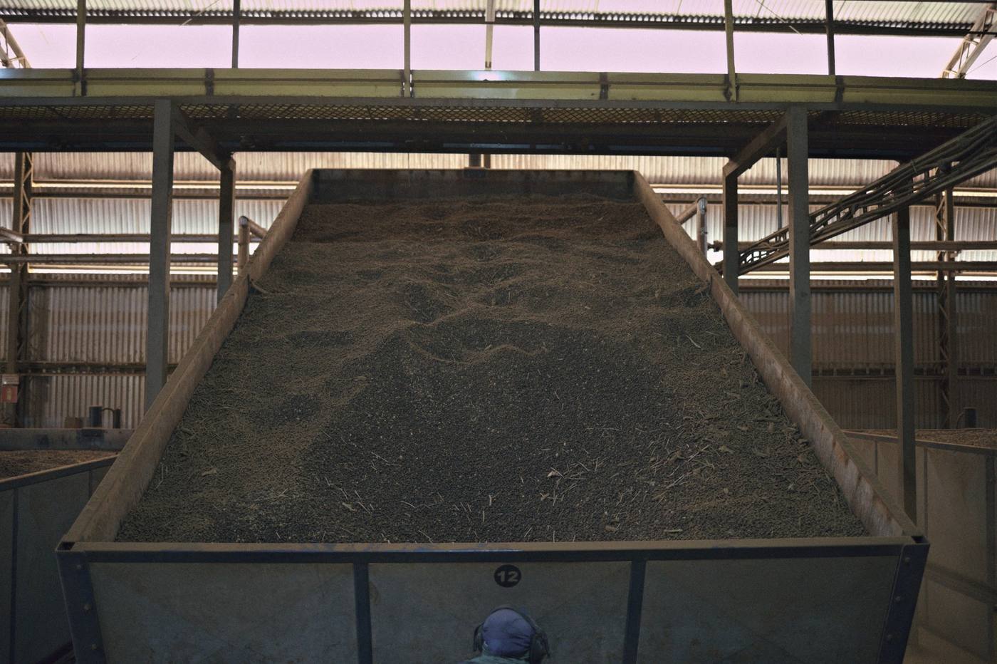 The dry mill, beans resting in the hopper