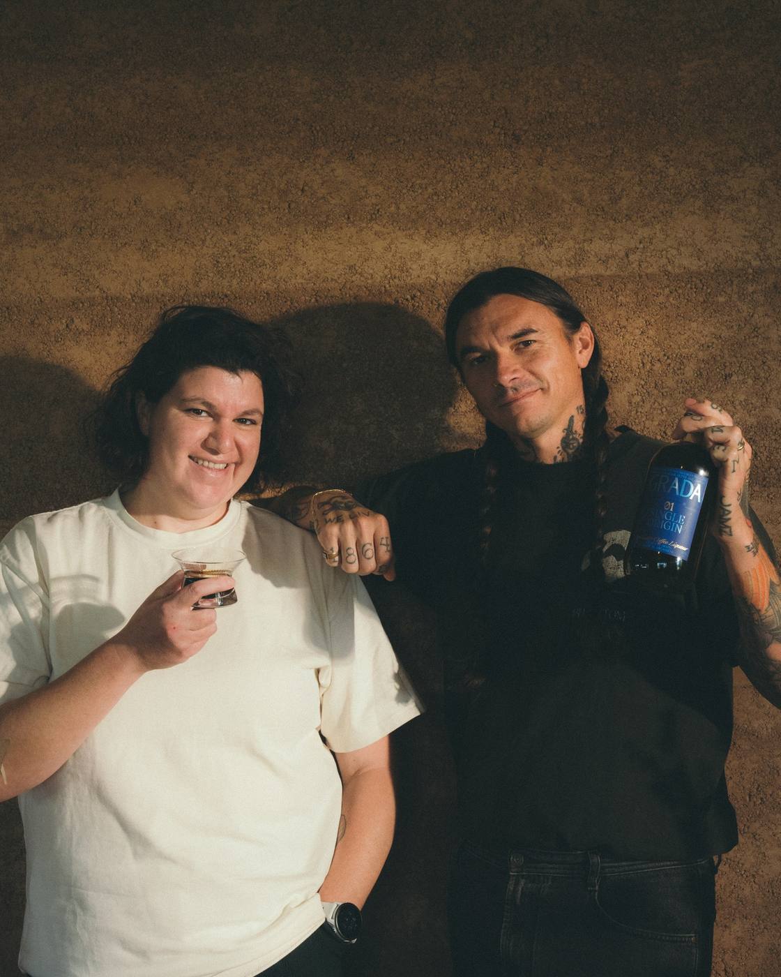 Clara and Thurman, hosts of Coffee 101, with a bottle of GRADA